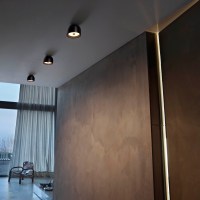 Wan from Flos, shown in black used as ceiling lights